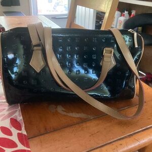 Arcadia Made in Italy Patent and Vachetta Leather Barrel Bag